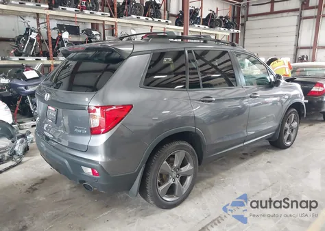 2021 Honda Passport Awd Touring from USA, damaged, VIN 5FNYF8H96MB024362
